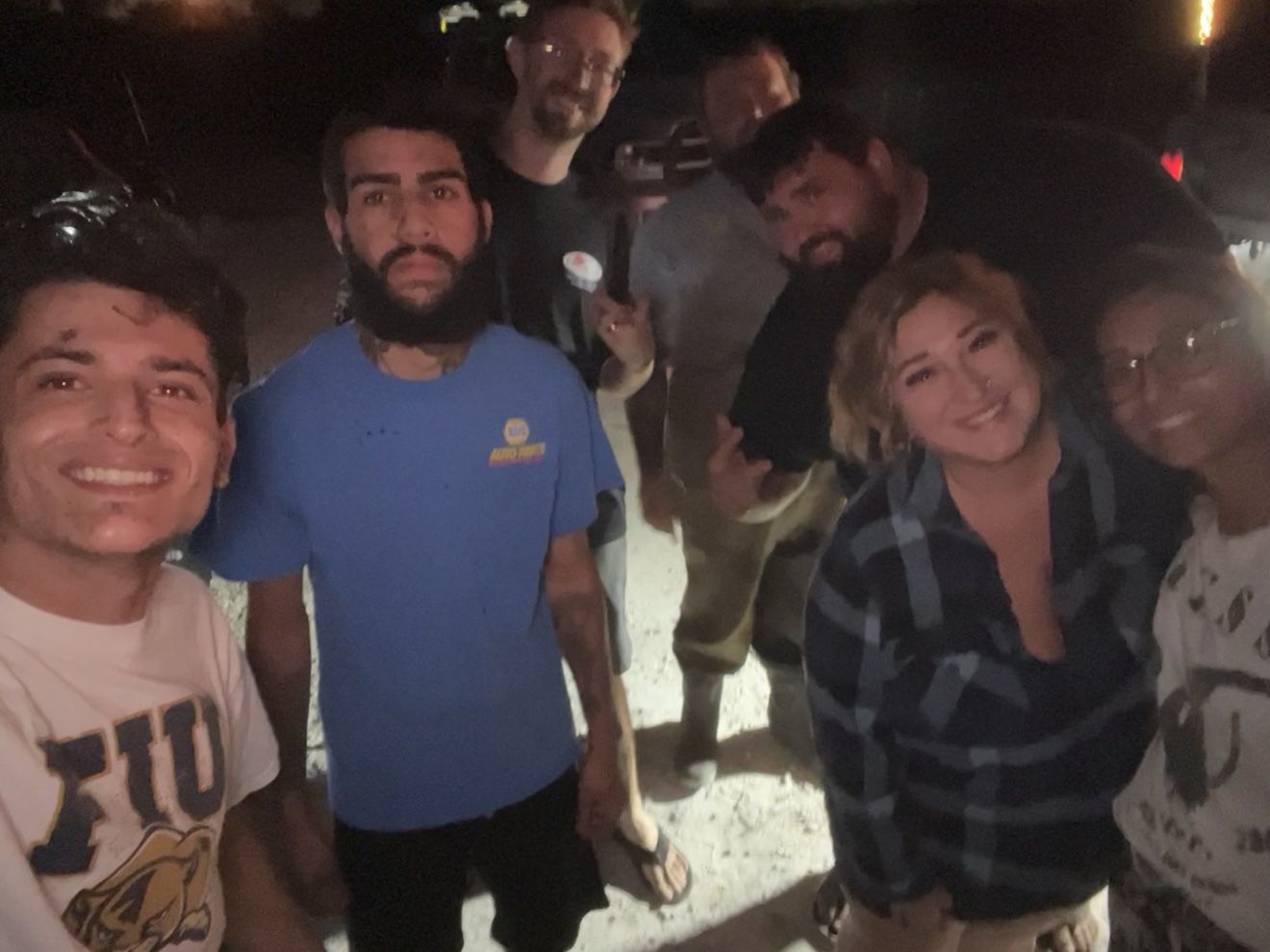 Night group selfie of riders