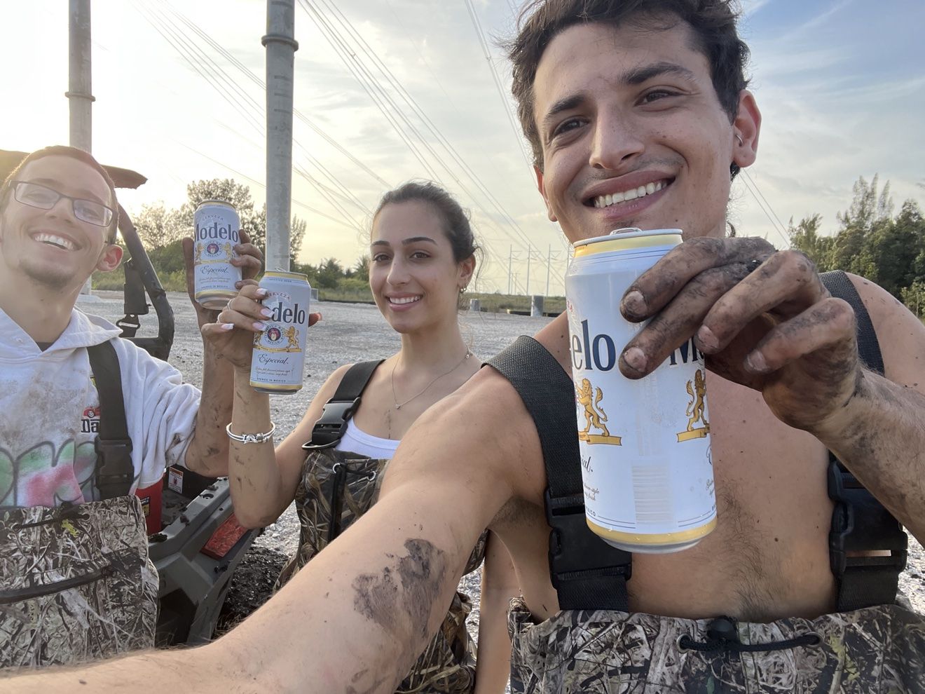 Friends toasting with drinks on the trail