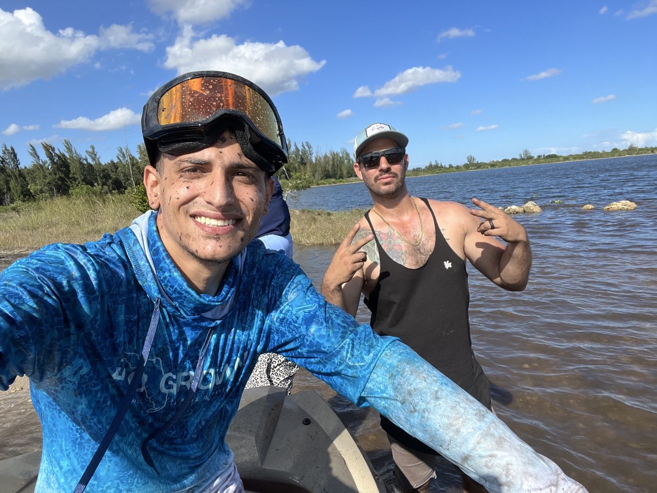 Rider selfie in a water trail with a friend