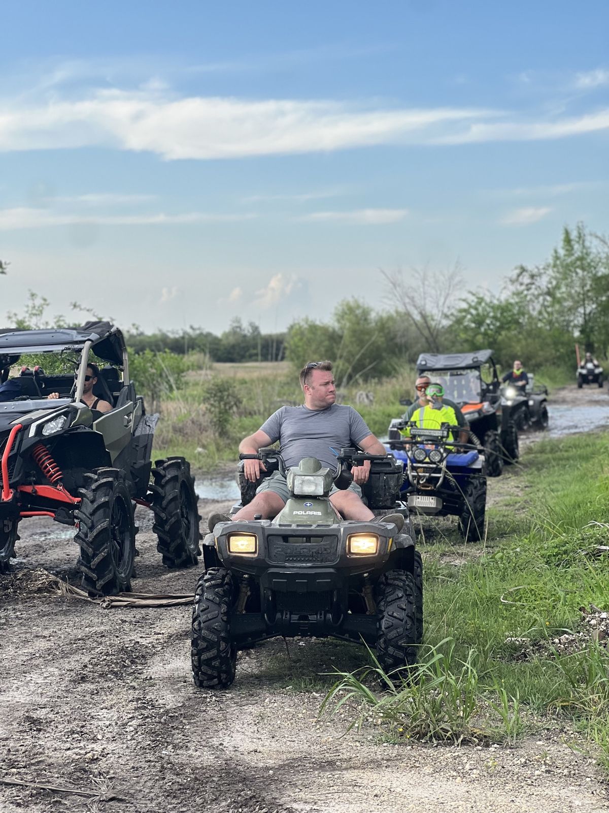 Lineup of ATVs at a staging area